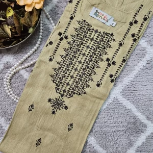 Cream color kurthi with black color thread sequence embroidery work on the yoke part