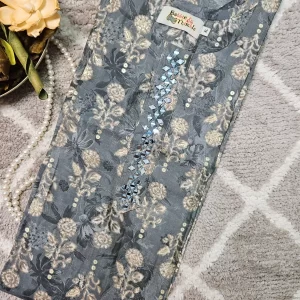 Grey color floral printed kurthi with minimal mirror work on the yoke part
