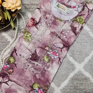 Purple color printed kurthi with mirror work on the yoke part