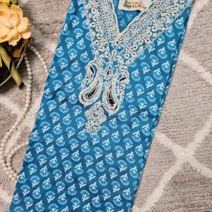 Blue color printed kurthi with cream thread embroidery work on the yoke part