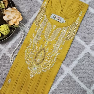 Yellow color kurthi with white color thread & Mirror work embroidery on the yoke part